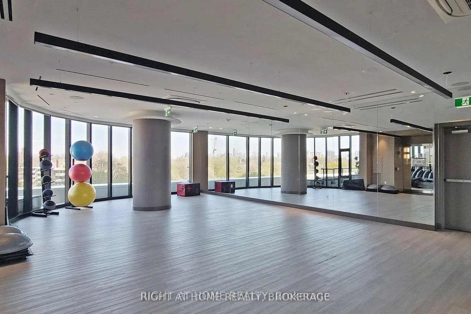 Building fitness studio with floor-to-ceiling windows