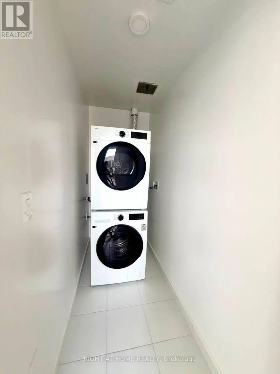 In-suite laundry with a stacked washer and dryer